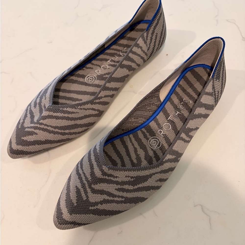 Rothy's Zebra Pattern Flats with Blue Trim NWOT never worn